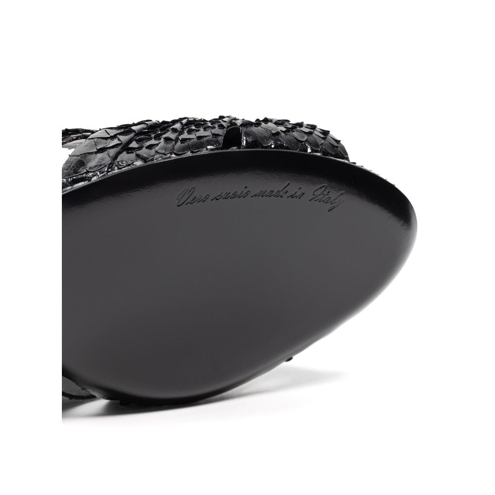 Sandals by Dolce & Gabbana for women in leather black showcases a sculptural silhouette as Women's Leather Sandals, defined by a sculptural and sculptural for a sculptural look.