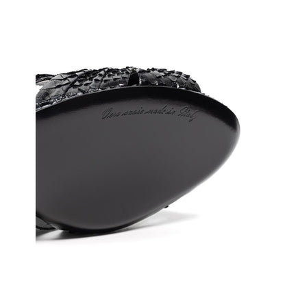 Sandals by Dolce & Gabbana for women in leather black showcases a sculptural silhouette as Women's Leather Sandals, defined by a sculptural and sculptural for a sculptural look.