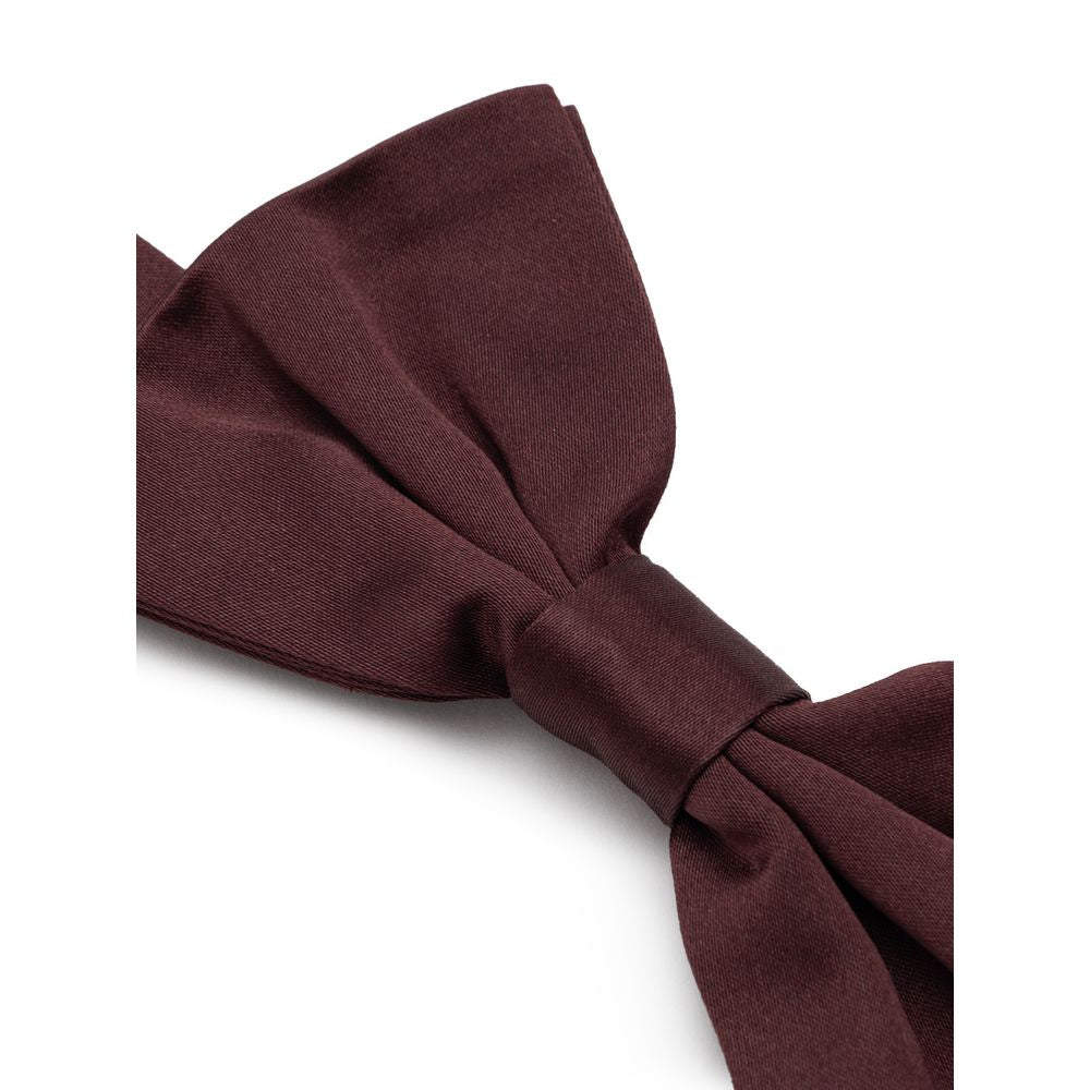 Necktie by Dolce & Gabbana for men in silk burgundy features a distinguished silhouette, perfectly showcasing the distinguished details of Silk Necktie.