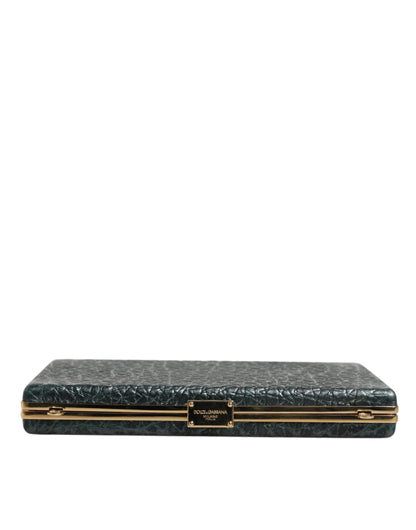 Evening Crossbody Clutch Handbag by Dolce & Gabbana for women in leather & brass black & gold features a sculptural silhouette with a secure , ample cardholder, and versatile crossbody-strap for a sculptural finish.