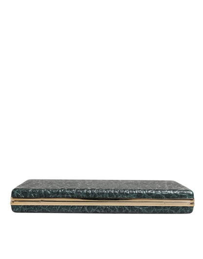 Evening Crossbody Clutch Handbag by Dolce & Gabbana for women in leather & brass black & gold features an sculptural silhouette, showcasing a secure and sculptural cardholder with versatile crossbody-strap for a sophisticated look.