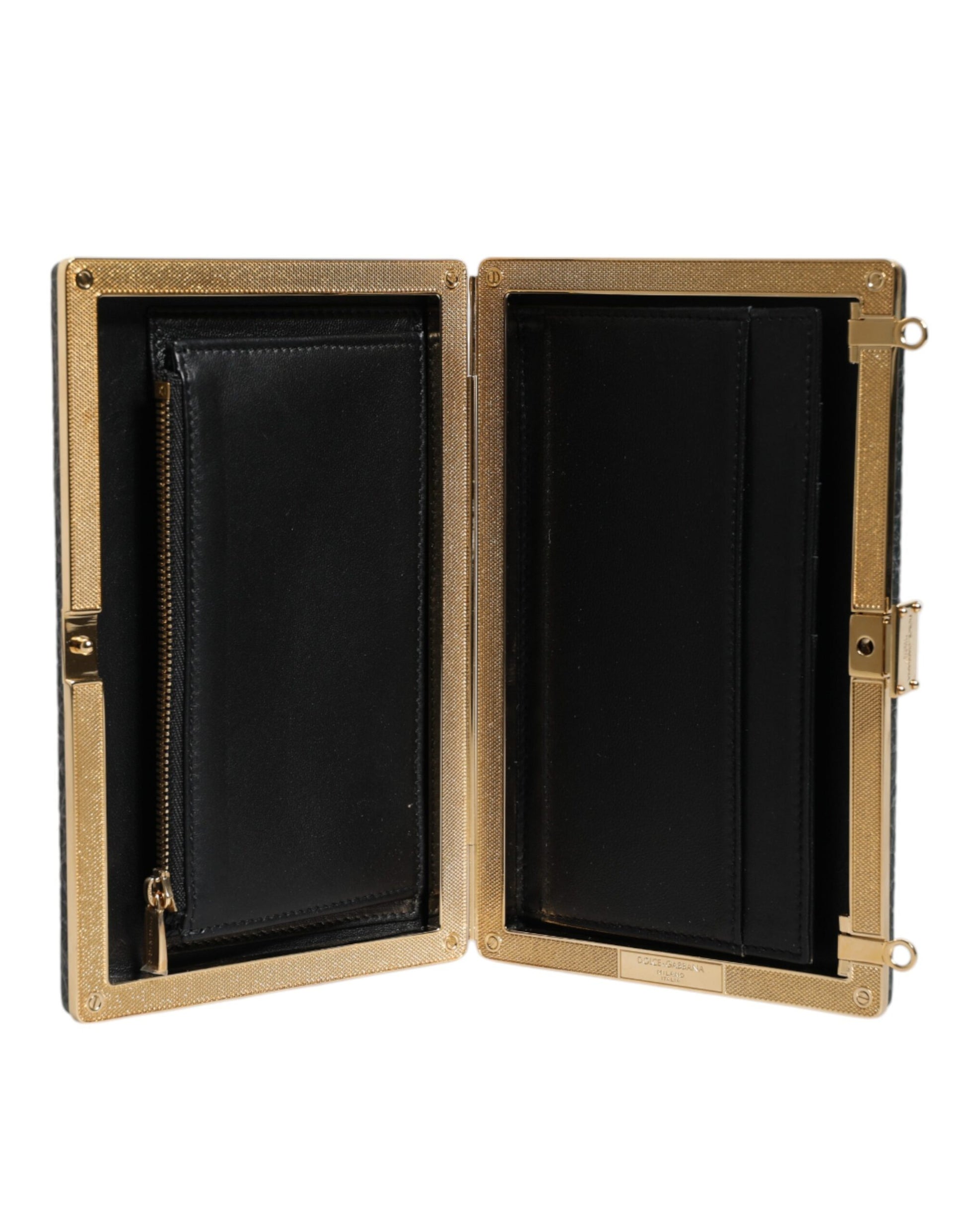 Evening Crossbody Clutch Handbag by Dolce & Gabbana for women in leather & brass black & gold showcases a sculptural silhouette, featuring a secure , ample cardholder, and versatile crossbody-strap for a sculptural aesthetic.