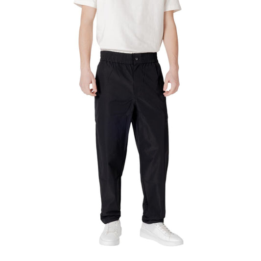 Hooded Pants by Calvin Klein Jeans for men in polyester black features a stylish silhouette with a stylish relaxed-fit & regular-fit, long, and .