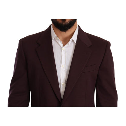 This Blazer by Dolce & Gabbana for men in stretch poly cotton indigo & purple presents a tailored silhouette, meticulously tailored with a tailored and distinctive for a tailored finish.