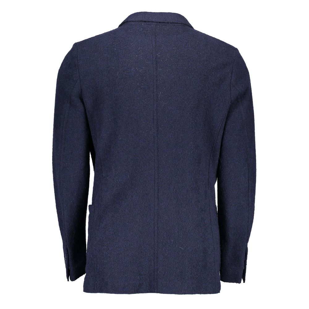 Blazer by Gant for men in polyamide wool blue showcases a polished silhouette, highlighted by a refined and polished for a sophisticated finish.