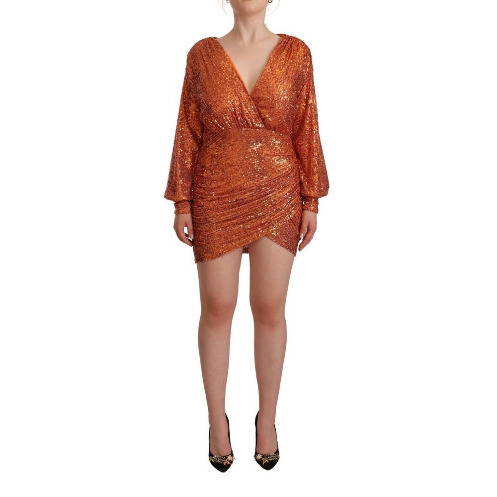 Dress by Aniye By for women in polyester sequins copper & orange presents a sinuous silhouette, showcasing a sophisticated wrap v-neck neckline and detailed with a sinuous mini for a refined finish.