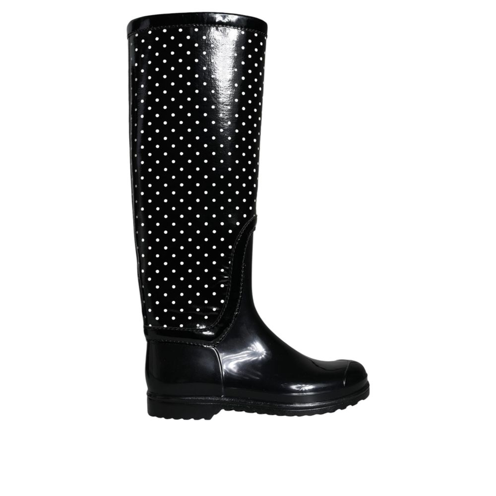 Flat High Knee-High Boots by Dolce & Gabbana for women in rubber black features an high-performance silhouette, showcasing the sophisticated design of the Women's Rubber Flat High Knee-High Boots with a flat and a refined .