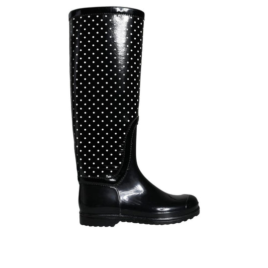 Flat High Knee-High Boots by Dolce & Gabbana for women in rubber black features an high-performance silhouette, showcasing the sophisticated design of the Women's Rubber Flat High Knee-High Boots with a flat and a refined .