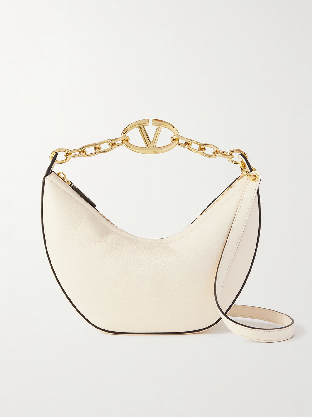 Small 2-in-1 Shoulder & Crossbody Hobo Convertible Handbag by Valentino Garavani for women in calfskin leather black, ivory & signature features a polished silhouette with a secure , ample , and polished crossbody-strap & shoulder-strap for a sophisticated look.