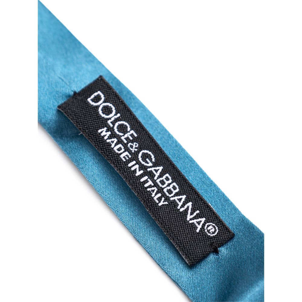 This Necktie by Dolce & Gabbana for men in silk blue presents a effortless chic silhouette from the Silk Necktie collection, offering a effortless chic finish for a truly effortless chic look.