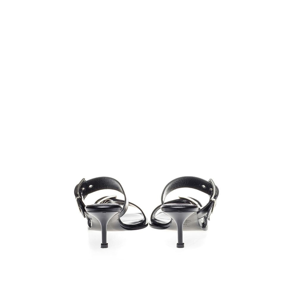 Sandals by Alexander McQueen for women in leather black showcases a sculptural silhouette as Women's Leather Sandals, defined by a sculptural and sculptural for a sculptural look.