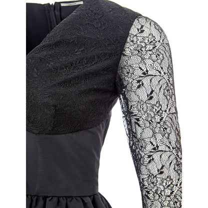 Dress by Lardini for women in polyester black & floral showcases a striking silhouette, elegantly detailed with a , refined v-neck neckline, and a striking midi for a striking finish.