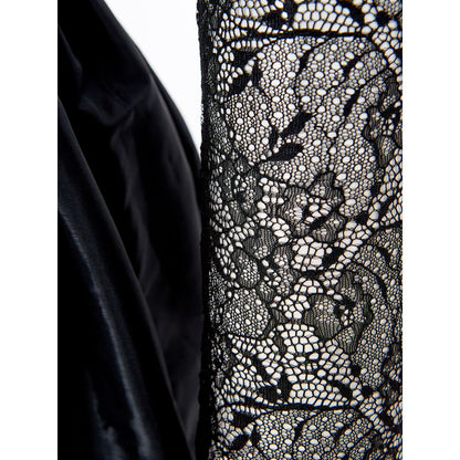 Dress by Lardini for women in polyester black & floral presents a sinuous silhouette, showcasing a sophisticated v-neck neckline and detailed with a sinuous midi for a refined finish.