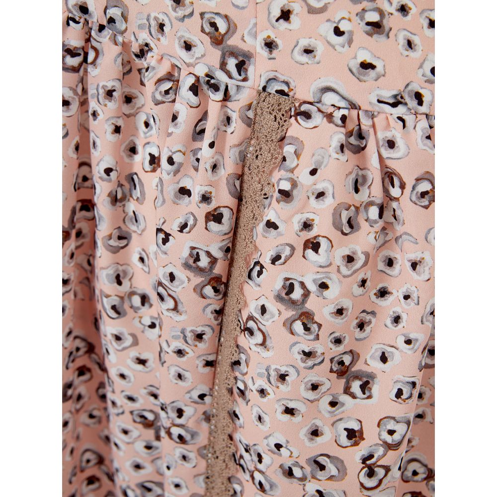 Dress by Lardini for women in acetate pink & floral features an sultry silhouette defined by a v-neck neckline and , falling to an sultry for a sultry look.