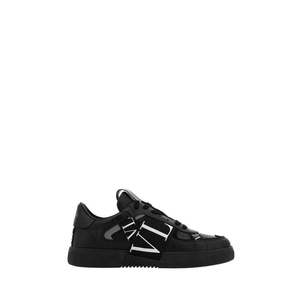 Sneakers by Valentino Garavani for men in bos taurus calfskin leather black & monogram presents a sumptuous silhouette, artfully capturing the essence of the Men's Low Top Bos Taurus Calfskin Leather Sneakers with its sumptuous low-top style design.