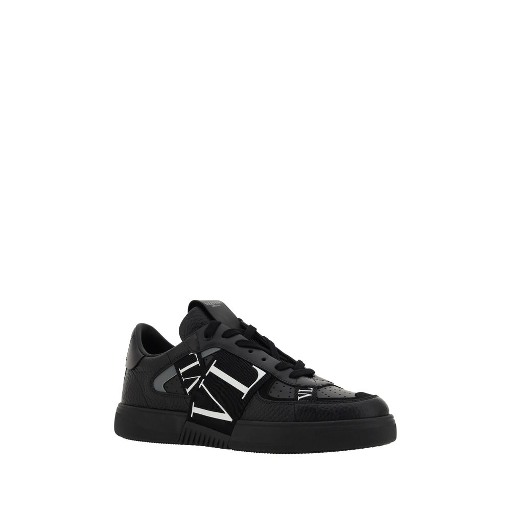 Sneakers by Valentino Garavani for men in bos taurus calfskin leather black & monogram presents a sumptuous silhouette from the Men's Low Top Bos Taurus Calfskin Leather Sneakers collection, showcasing a sumptuous low-top style for an elevated aesthetic.