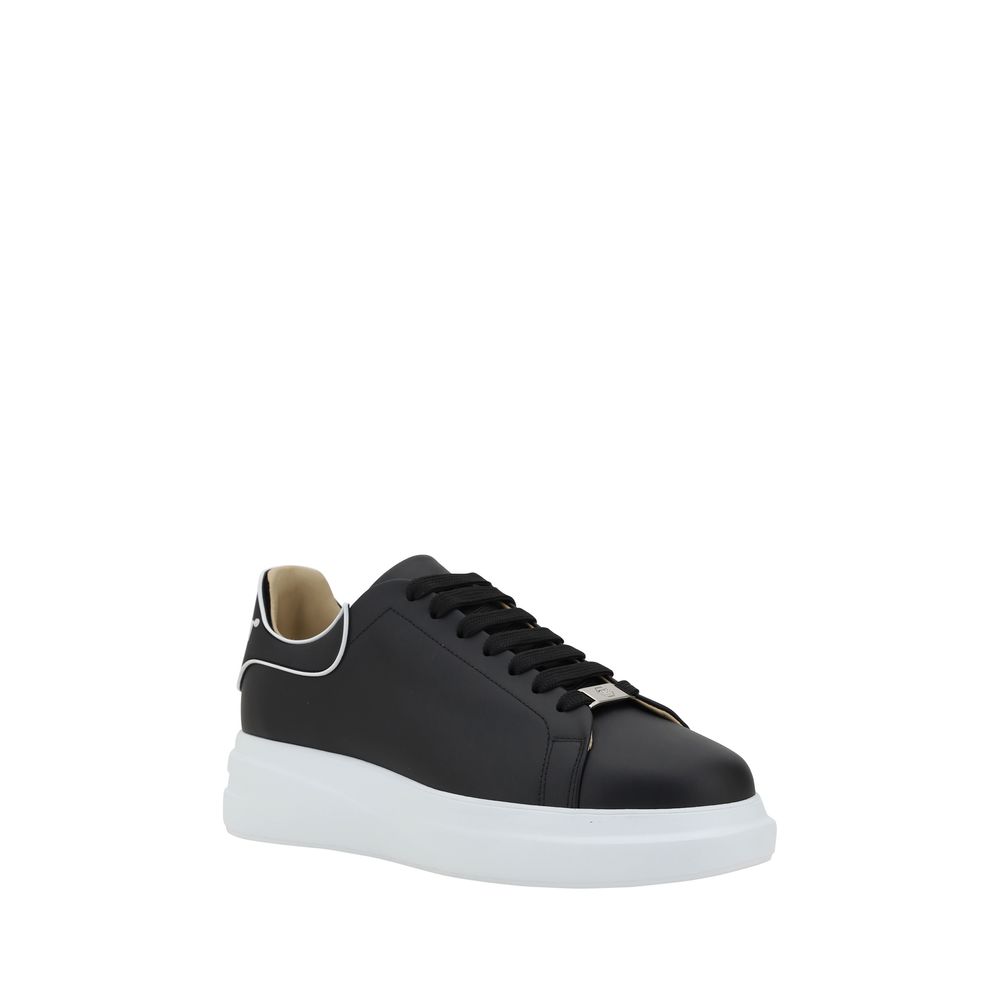 Sneakers by Philipp Plein for men in bos taurus calf leather black & monogram presents a sumptuous silhouette, artfully capturing the essence of the Men's Fashion Bos Taurus Calf Leather Sneakers with its sumptuous fashion style design.