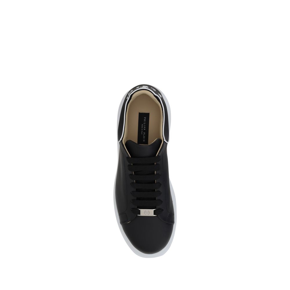 Sneakers by Philipp Plein for men in bos taurus calf leather black & monogram presents a on trend silhouette from the Men's Fashion Bos Taurus Calf Leather Sneakers collection, showcasing a on trend fashion style for an elevated aesthetic.