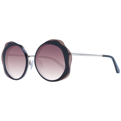 Sunglasses by Ted Baker for women in acetate black showcases a ethereal silhouette, featuring black coloured frame full-rim round frame design with gradient category-3-dark-tint lens for a ethereal finish.