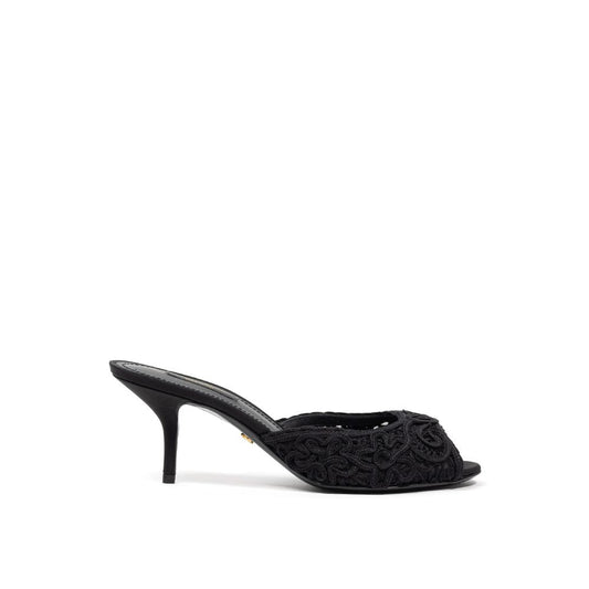 Sandals by Dolce & Gabbana for women in cotton and black presents a captivating silhouette, showcasing the signature style of the Women's Cotton Sandals with a captivating and captivating .