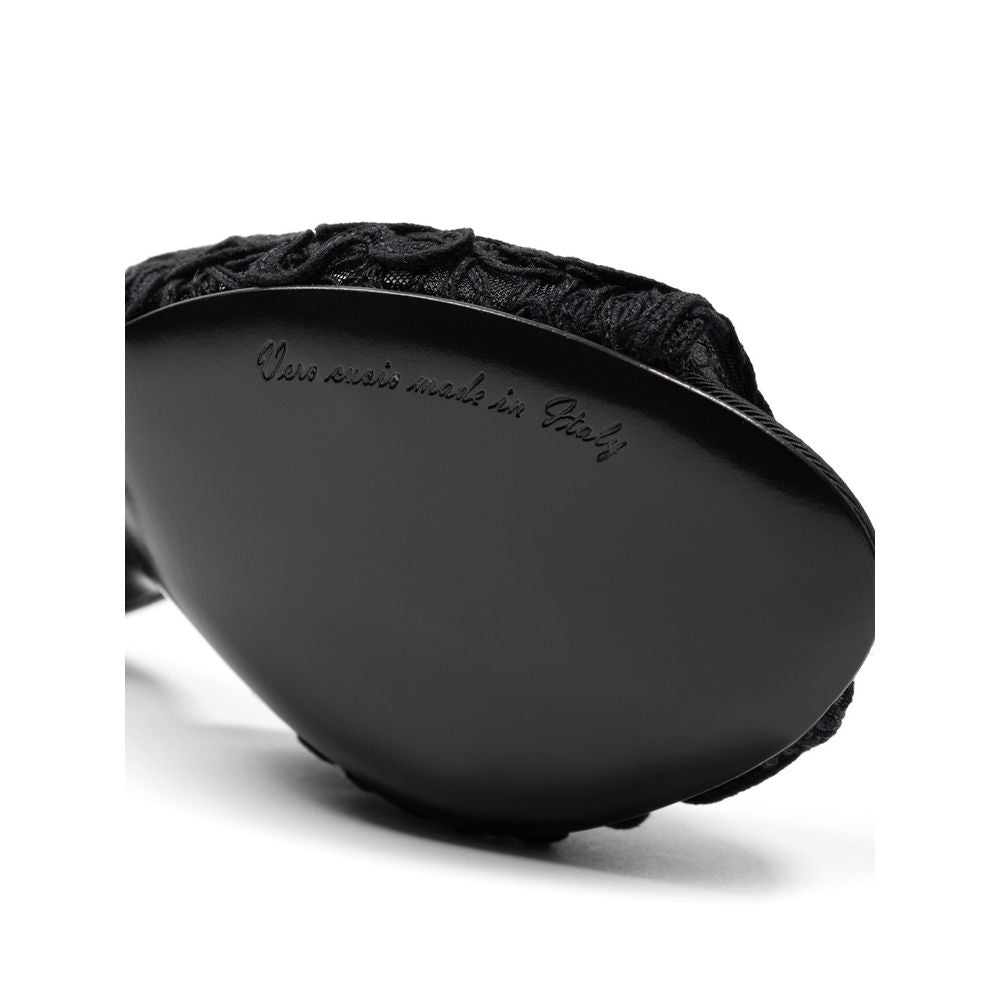 Sandals by Dolce & Gabbana for women in cotton black features an effortlessly chic silhouette from the Women's Cotton Sandals collection, showcasing a effortlessly chic and elegant .