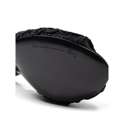 Sandals by Dolce & Gabbana for women in cotton black features an effortlessly chic silhouette from the Women's Cotton Sandals collection, showcasing a effortlessly chic and elegant .