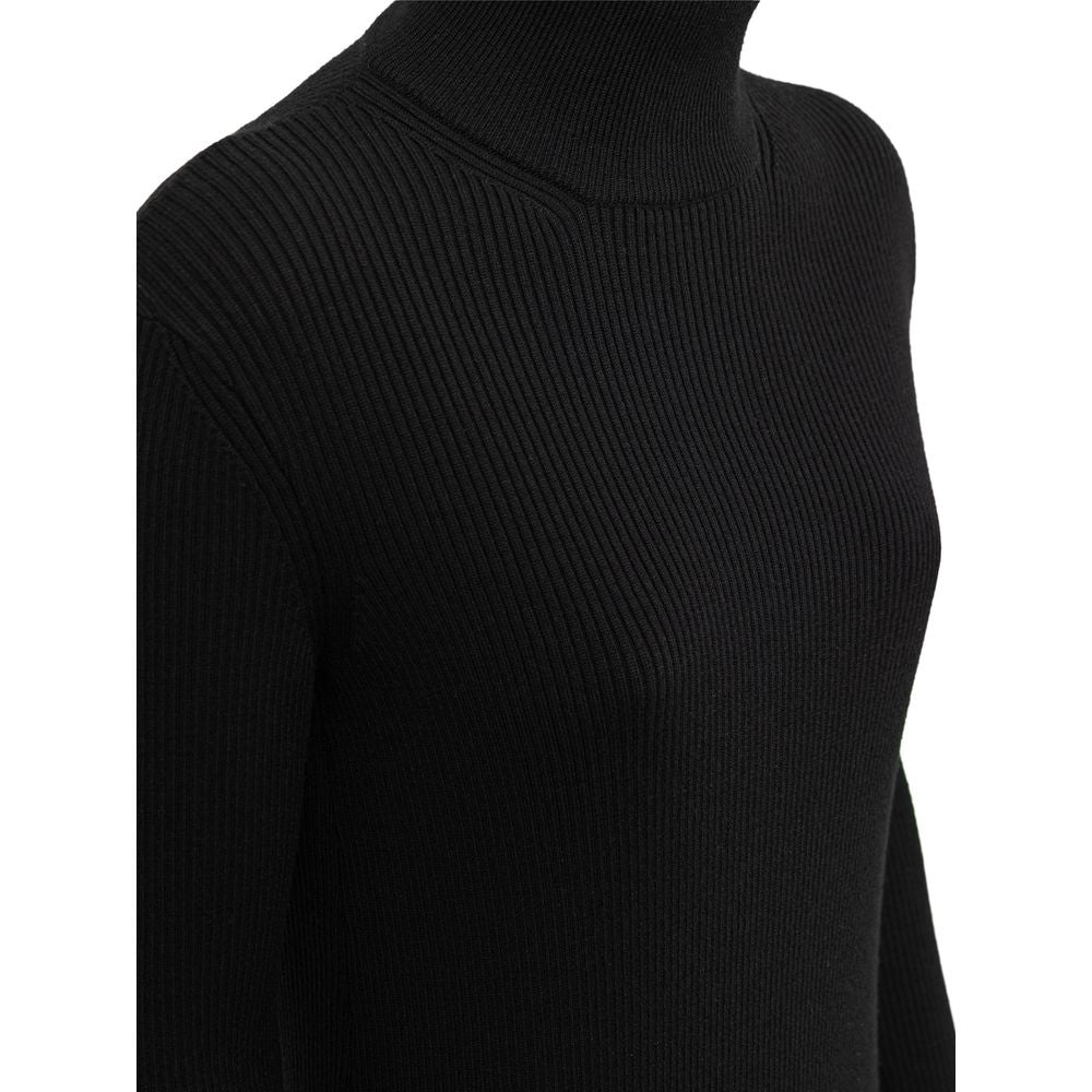 Dress by Bottega Veneta for women in wool black features a dramatic silhouette, showcasing an elegant wrap turtle neckline and that flows into a dramatic knee.