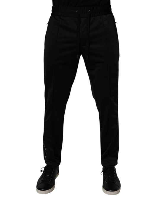 Jogger Sweatpants by Dolce & Gabbana for men in polyester black features an kinetic relaxed-fit and long with a , showcasing high-performance for an kinetic look.