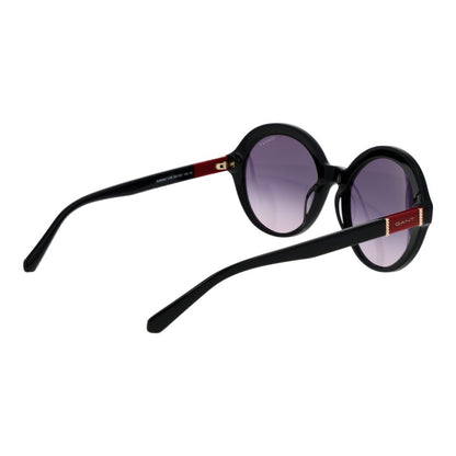 Sunglasses by Gant for women in acetate and black featuring an opulent full-rim round frame design with a sophisticated black coloured frame finish and high-performance gradient category-3-dark-tint lens.