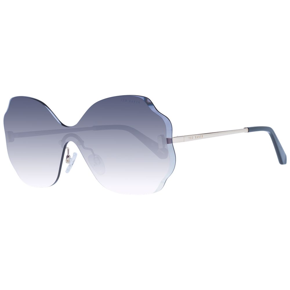 Sunglasses by Ted Baker for women in stainless steel and gold featuring an opulent rimless mono-lens frame design with a sophisticated gold coloured frame finish and high-performance gradient category-3-dark-tint lens.