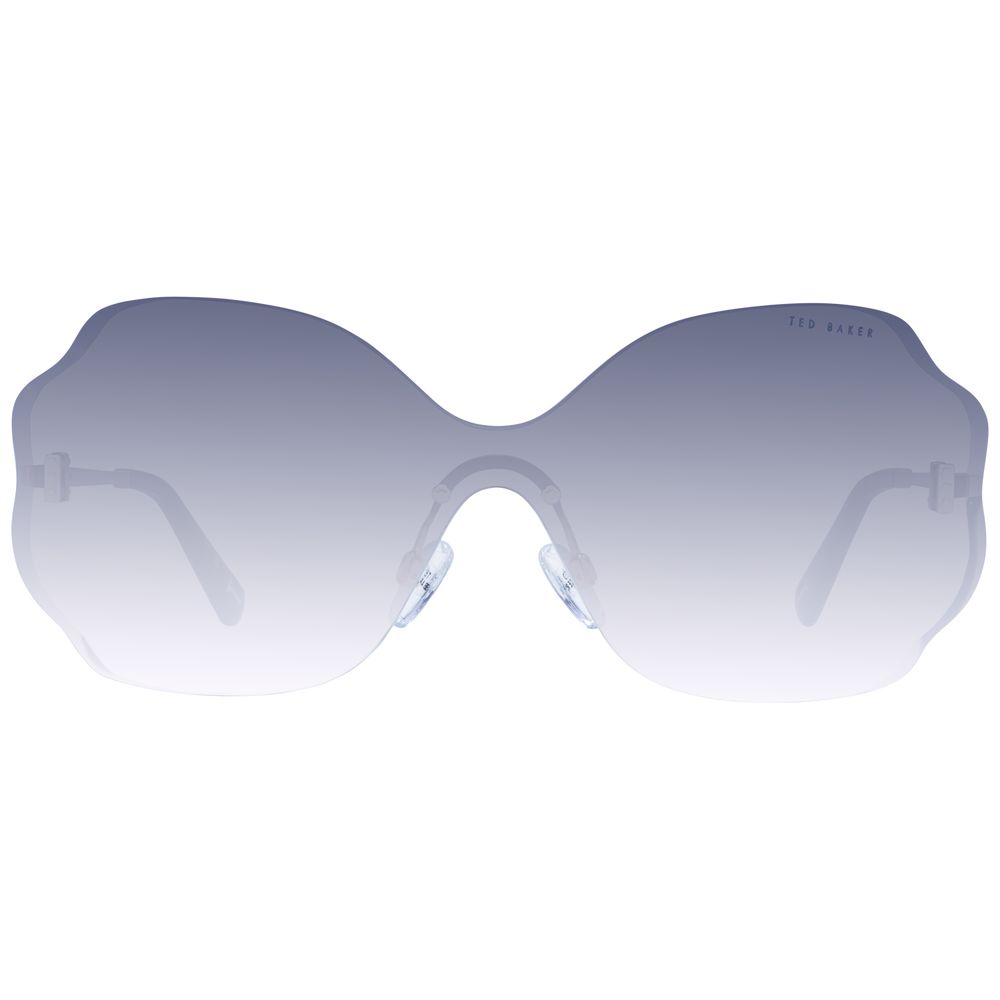 Sunglasses by Ted Baker for women in stainless steel gold showcases a ethereal silhouette, featuring gold coloured frame rimless mono-lens frame design with gradient category-3-dark-tint lens for a ethereal finish.