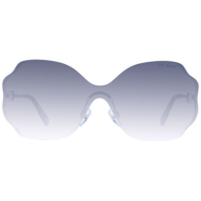 Sunglasses by Ted Baker for women in stainless steel gold showcases a ethereal silhouette, featuring gold coloured frame rimless mono-lens frame design with gradient category-3-dark-tint lens for a ethereal finish.
