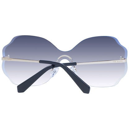 Sunglasses by Ted Baker for women in and gold presents a sumptuous silhouette, featuring gold coloured frame and rimless mono-lens frame design with gradient category-3-dark-tint lens for a sumptuous look.