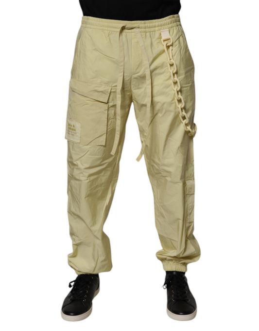 Joggers by Dolce & Gabbana for men in nylon & polyester yellow features a refined silhouette with a refined , defined by a mid rise and a refined long for a refined finish.