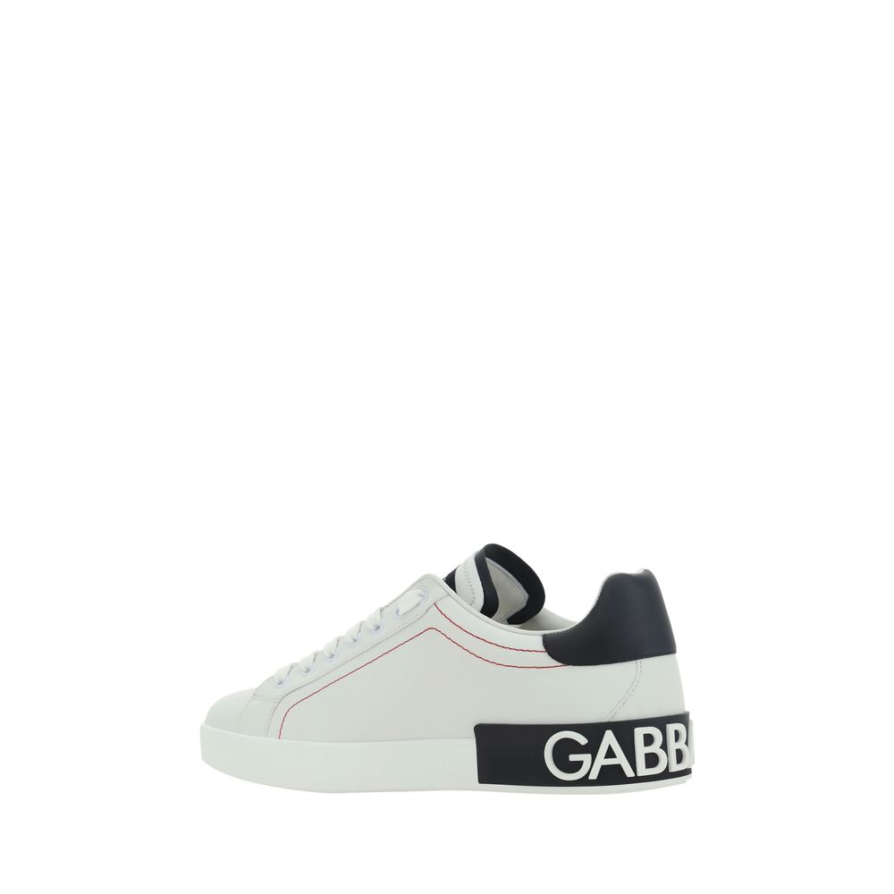 Sneakers by Dolce & Gabbana for men in bos taurus calfskin leather white presents a sumptuous silhouette, artfully capturing the essence of the Men's Low Top Bos Taurus Calfskin Leather Sneakers with its sumptuous low-top style design.