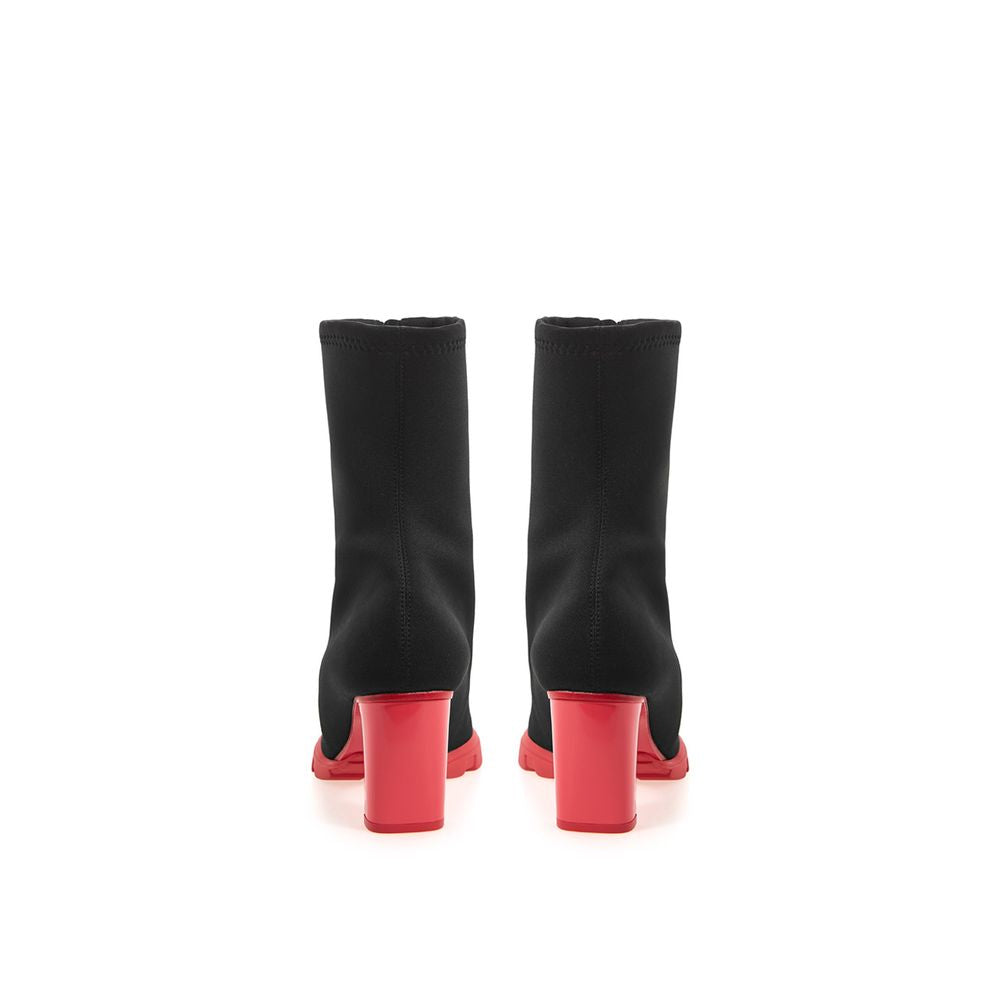 High-Heel Sock Ankle Boots by Alexander McQueen for women in neoprene black features an dynamic silhouette, showcasing the dynamic Women's Neoprene High-Heel Sock Ankle Boots design with its distinctive 10-cm-heel high-heel and elegant round toe style.