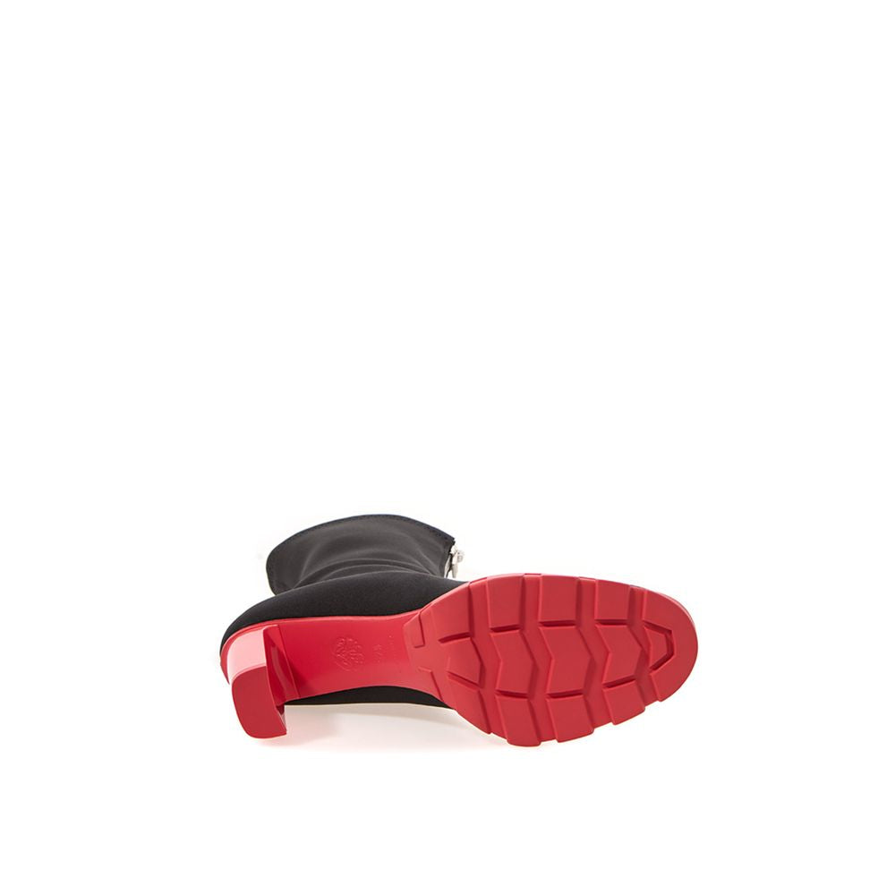 High-Heel Sock Ankle Boots by Alexander McQueen for women in neoprene black features an high-performance silhouette, showcasing the sophisticated design of the Women's Neoprene High-Heel Sock Ankle Boots with a 10-cm-heel high-heel and a refined round toe style.