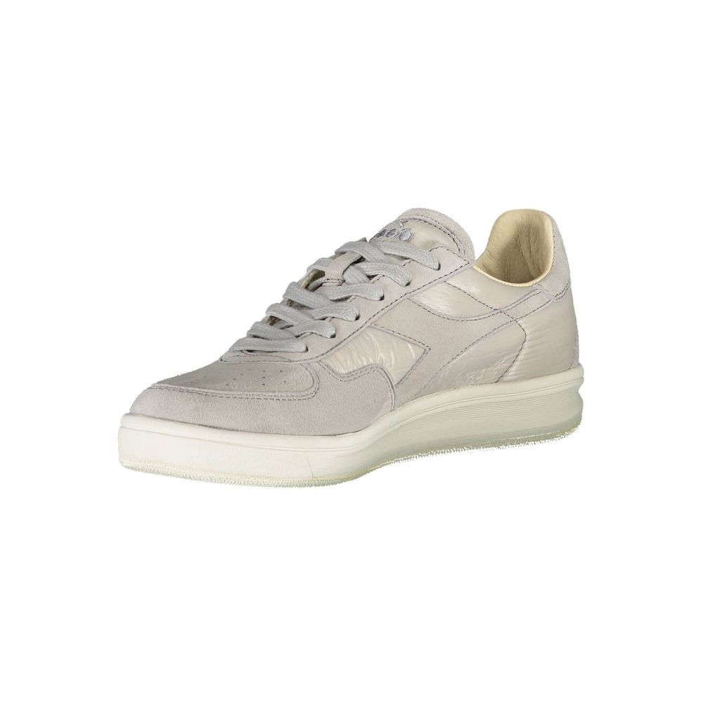 Sneakers by Diadora for women in leather & cotton gray features an opulent silhouette from the Women's Athletic Leather & Cotton Sneakers collection, showcasing a signature athletic style with an opulent finish.