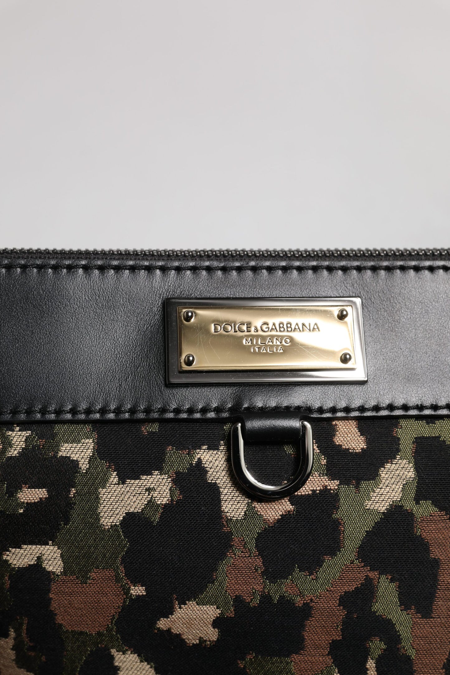 Pouch Backpack by Dolce & Gabbana for men in acrylic leather & cotton gold, multicolor, silver, leopard-print, camouflage, jacquard & print features a architectural Acrylic Leather Cotton Pouch Backpack design with a secure zipper, ample , and versatile for a architectural finish.