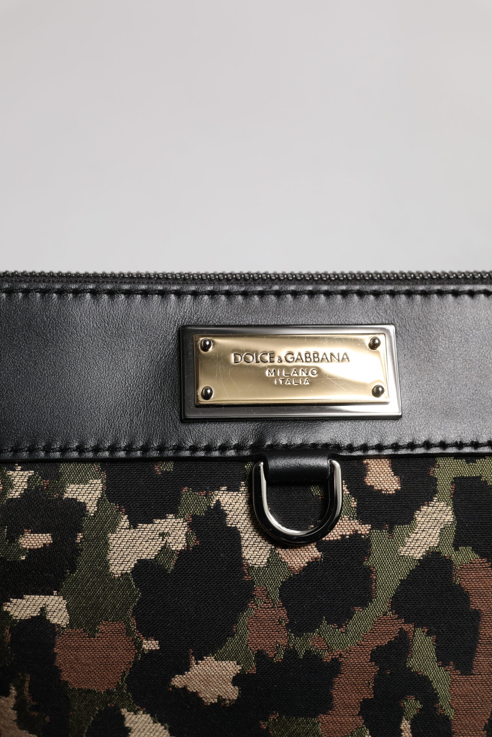 Pouch Backpack by Dolce & Gabbana for men in acrylic leather & cotton gold, multicolor, silver, leopard-print, camouflage, jacquard & print features a architectural Acrylic Leather Cotton Pouch Backpack design with a secure zipper, ample , and versatile for a architectural finish.