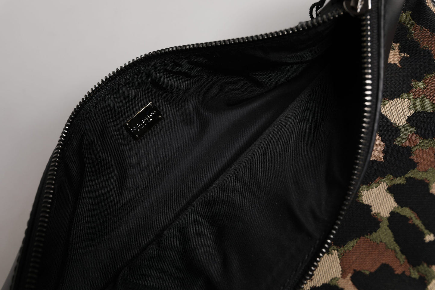 Pouch Backpack by Dolce & Gabbana for men in acrylic leather & cotton gold, multicolor, silver, leopard-print, camouflage, jacquard & print presents a stately Acrylic Leather Cotton Pouch Backpack design, showcasing a secure zipper with ample and versatile for a stately finish.