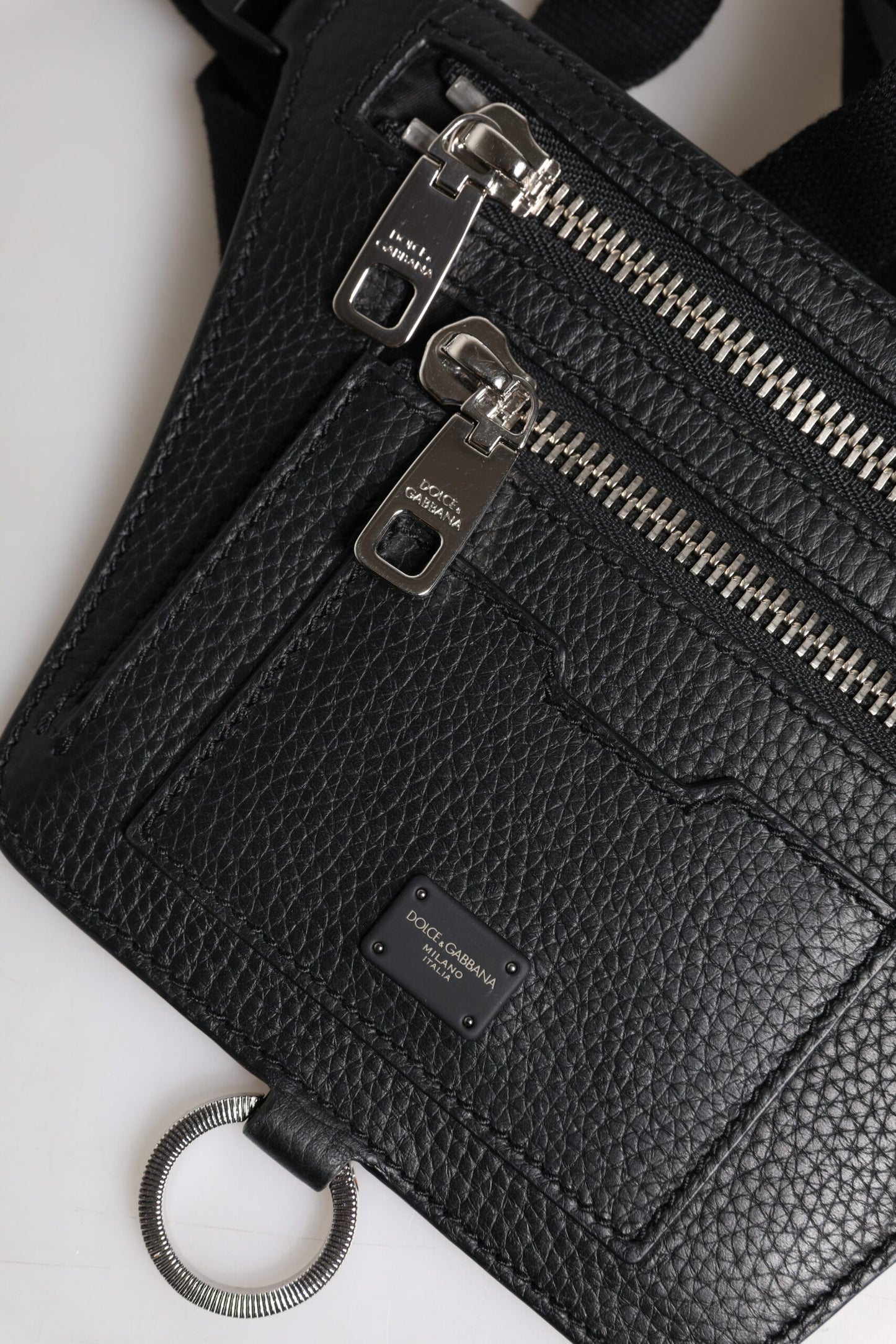 Fanny Pack Backpack by Dolce & Gabbana for men in calfskin black showcases a stately Calfskin Fanny Pack Backpack design, featuring a secure zipper with stately and versatile belt-strap.