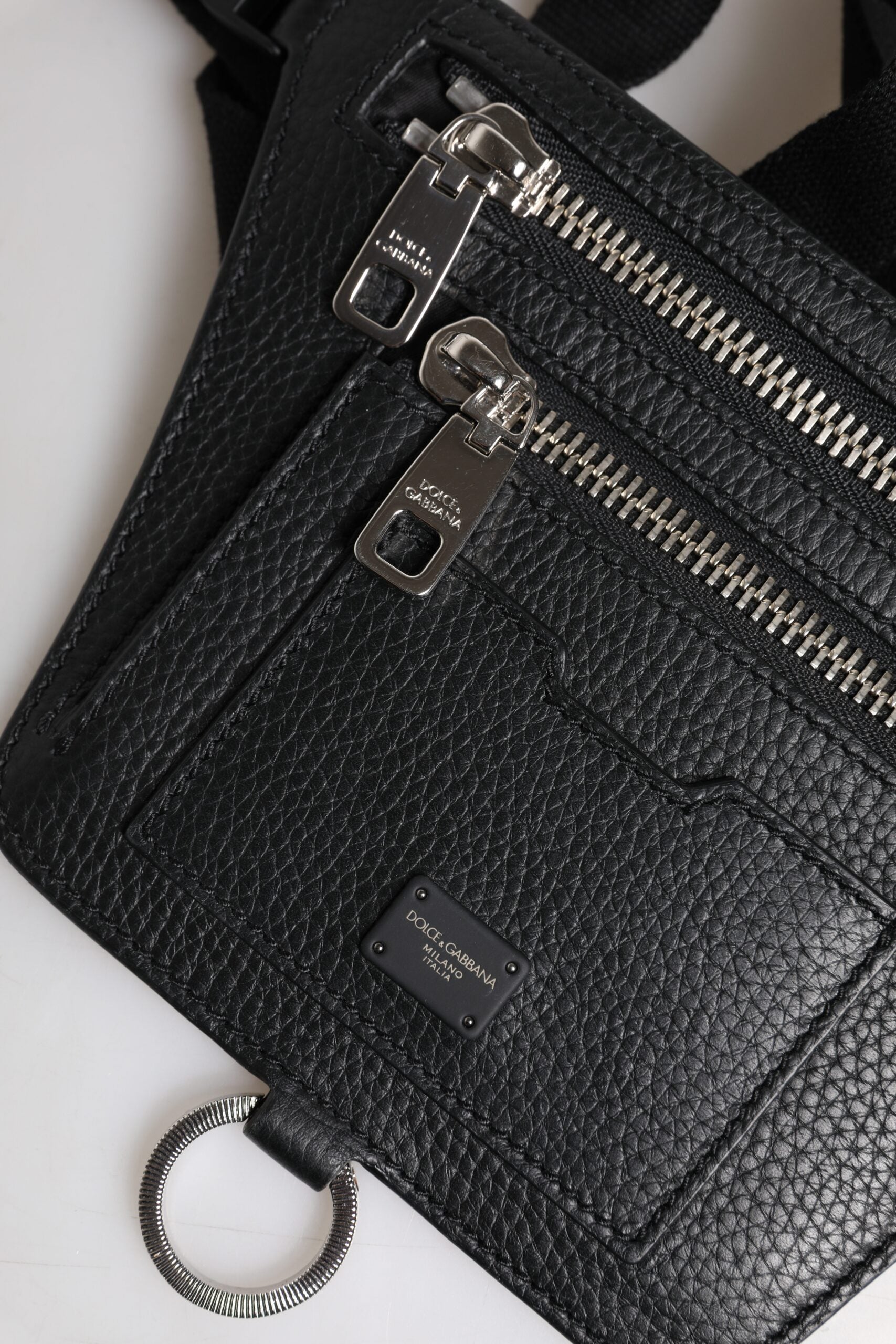 Fanny Pack Backpack by Dolce & Gabbana for men in calfskin black showcases a stately Calfskin Fanny Pack Backpack design, featuring a secure zipper with stately and versatile belt-strap.