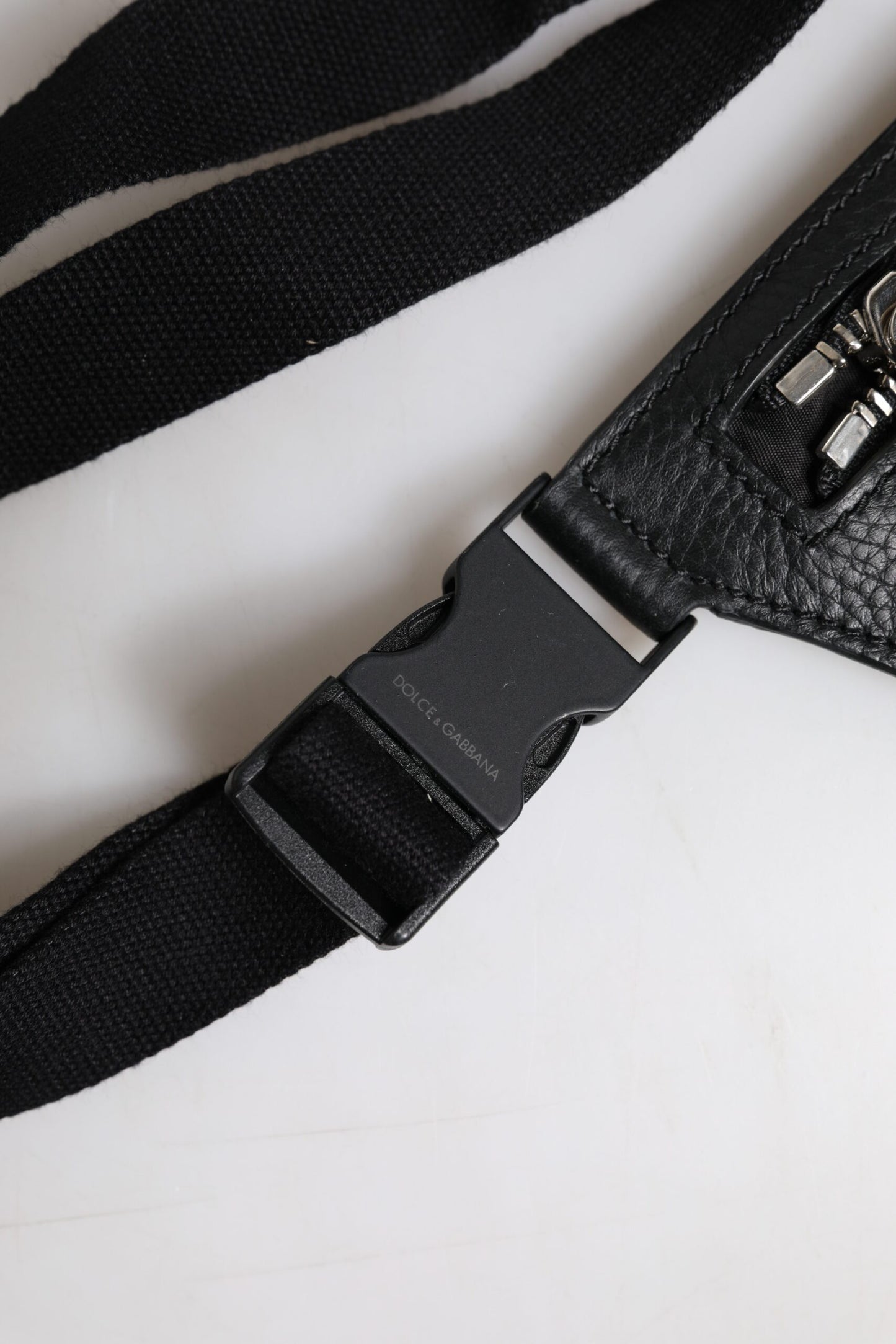 Fanny Pack Backpack by Dolce & Gabbana for men in calfskin black presents a stately Calfskin Fanny Pack Backpack design, showcasing a secure zipper with ample and versatile belt-strap for a stately finish.