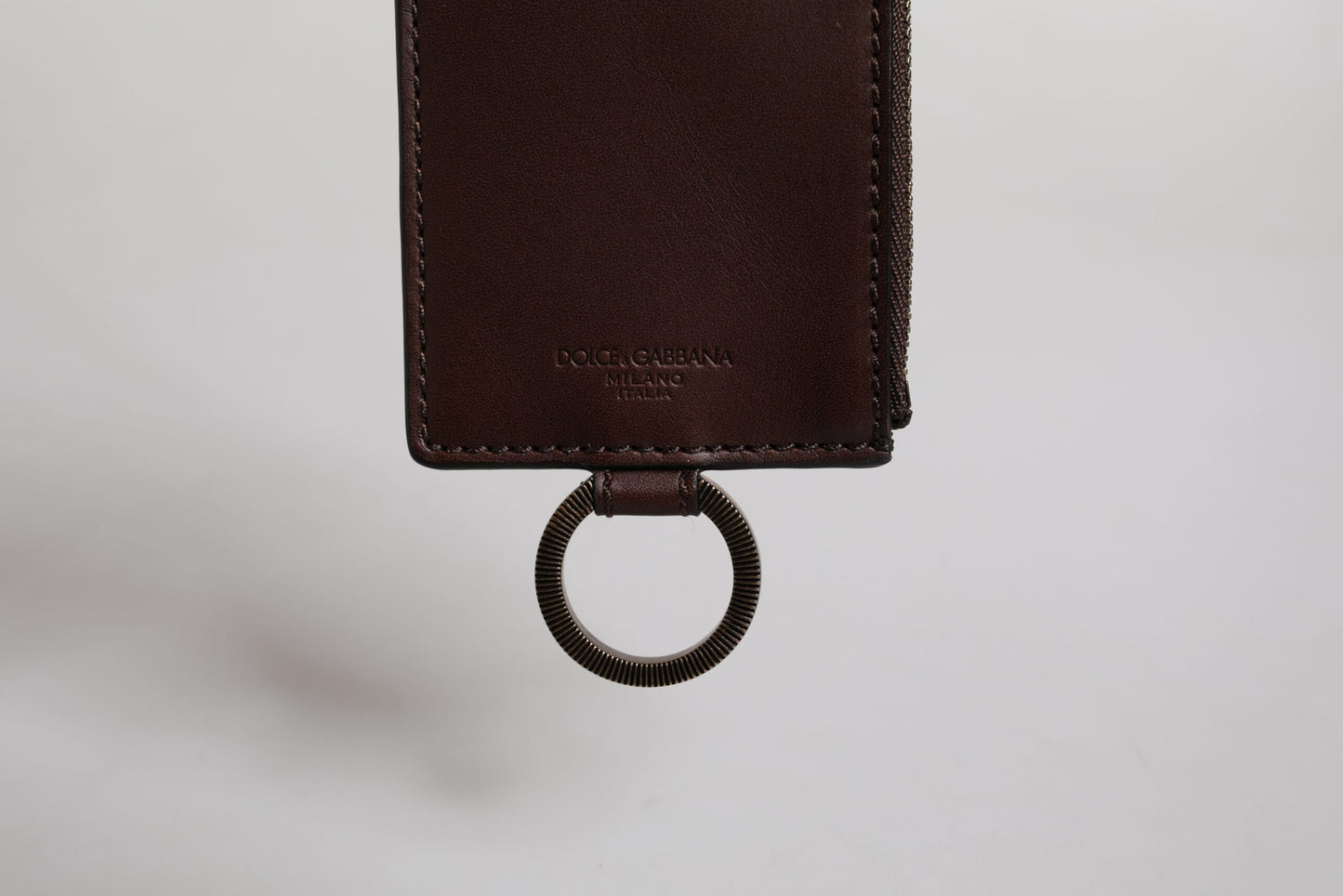 Cardholder Wallet by Dolce & Gabbana for men in calfskin leather brown showcases a refined silhouette, artfully capturing the essence of the refined Calfskin Leather Cardholder Wallet design with functional card-organization.