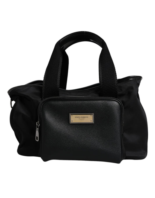 Pet Carry Backpack by Dolce & Gabbana for men in leather & nylon black & silver showcases an architectural Leather Nylon Pet Carry Backpack design, featuring a secure zipper, ample , and architectural shoulder-strap, handle, adjustable-strap & detachable-strap for a sophisticated look.