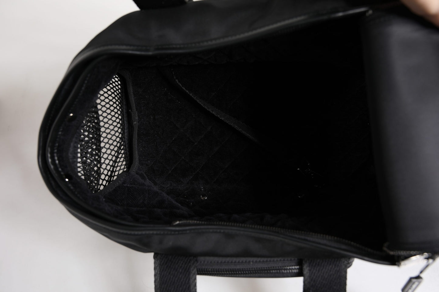Pet Carry Backpack by Dolce & Gabbana for men in leather & nylon black & silver showcases a stately Leather Nylon Pet Carry Backpack design, featuring a secure zipper with stately and versatile shoulder-strap, handle, adjustable-strap & detachable-strap.