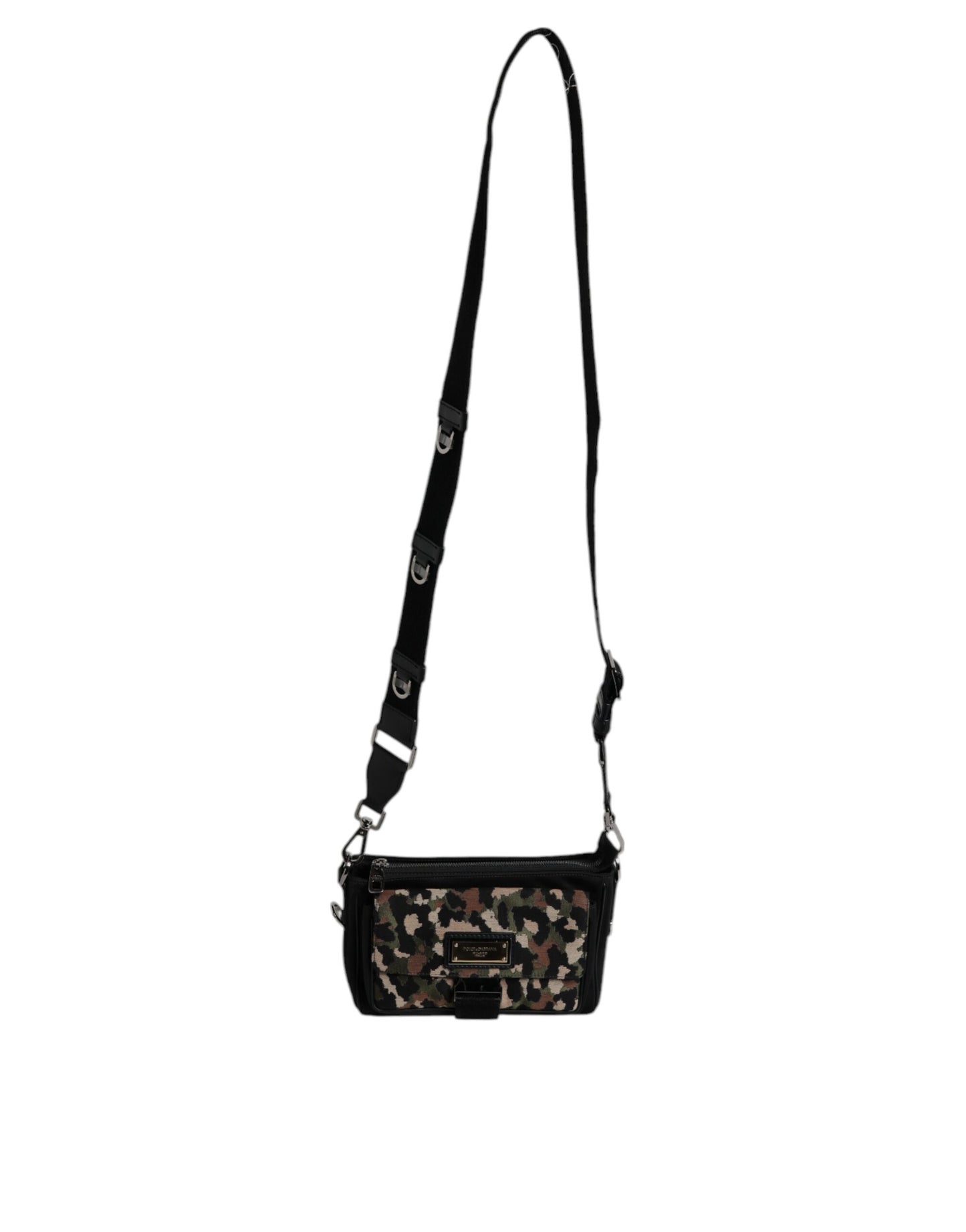 Crossbody Flap Backpack by Dolce & Gabbana for men in leather & poly cotton multicolor, silver, patterned & jacquard presents a stately Leather Poly Cotton Crossbody Flap Backpack design, showcasing a secure flap, zipper & buckle with ample and versatile crossbody-strap, shoulder-strap, adjustable-strap & detachable-strap for a stately finish.