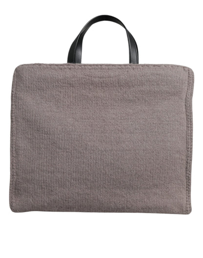 Shoulder Tote Bag by Dolce & Gabbana for men in alpaca wool & leather black & gray features a jet-set sophisticated Alpaca Wool Leather Shoulder Tote Bag design with a secure , ample , and versatile shoulder-strap & handle for a jet-set sophisticated finish.