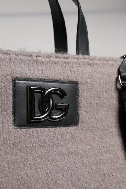 This Shoulder Tote Bag by Dolce & Gabbana for men in alpaca wool & leather black & gray features an jet-set Alpaca Wool Leather Shoulder Tote Bag design with a secure , ample , and jet-set shoulder-strap & handle.